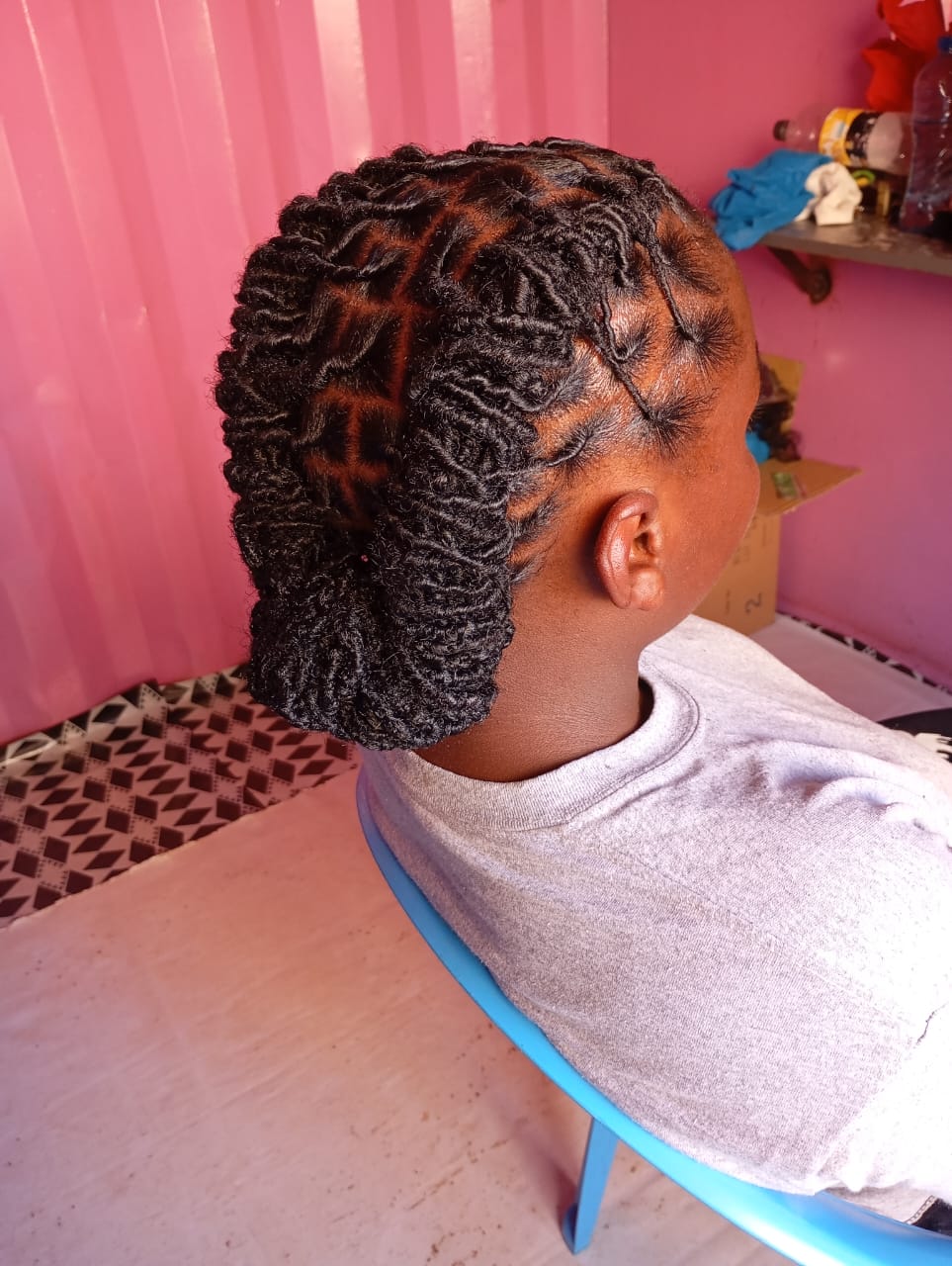 Dreadlocs retouch service at Blessed Rayna Salon